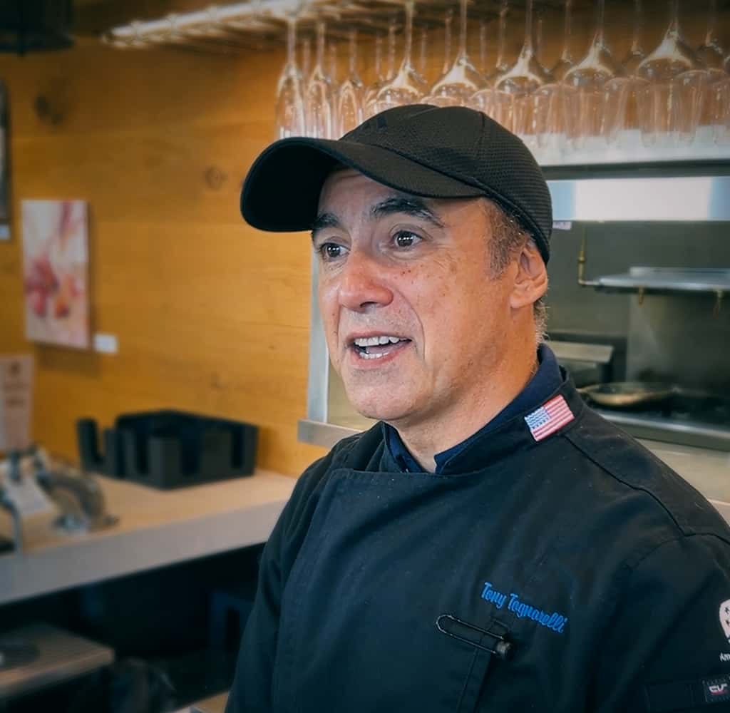 giddy goat Culinary Director Tony Tognarelli with unox combi oven in background